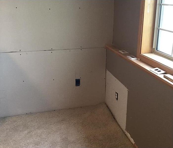 The wall fixed with sheetrock.