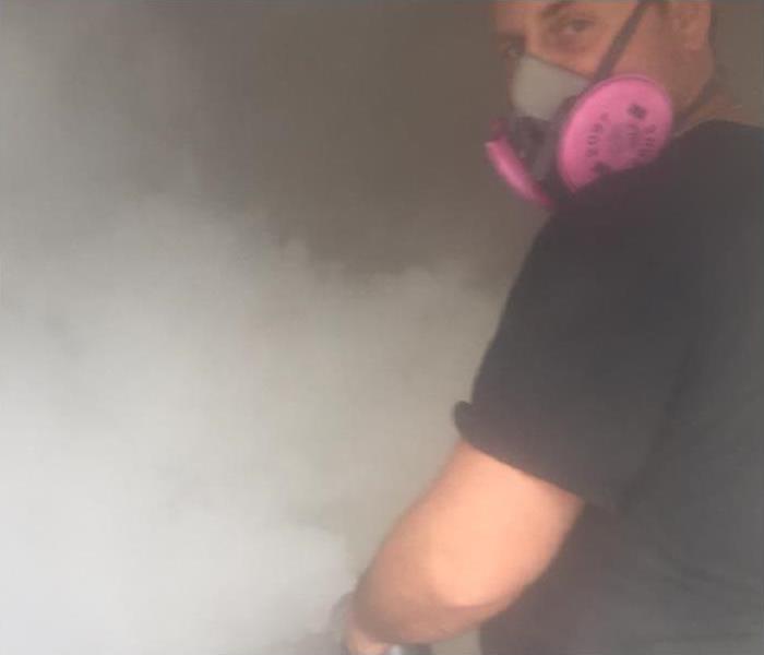 Smoke and a SERVPRO employee. 