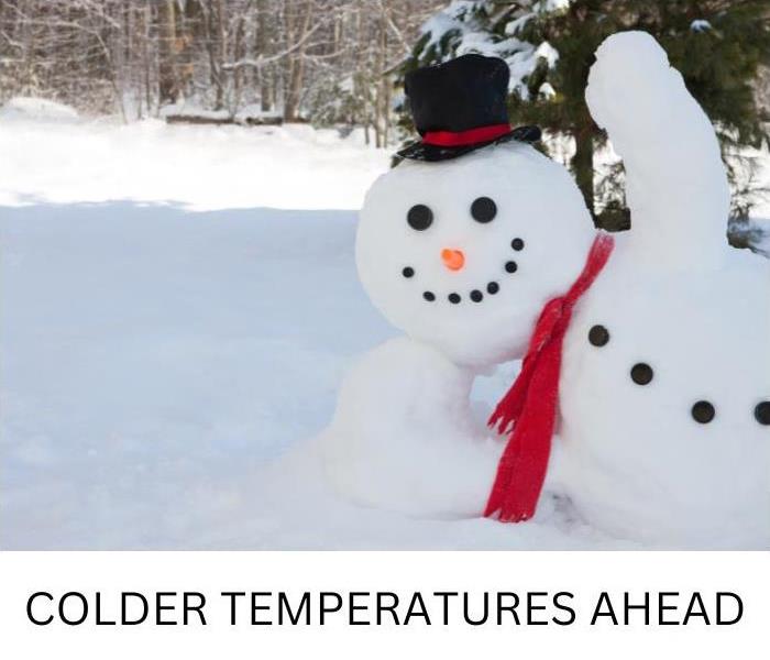 Snowman and says colder temperatures ahead.