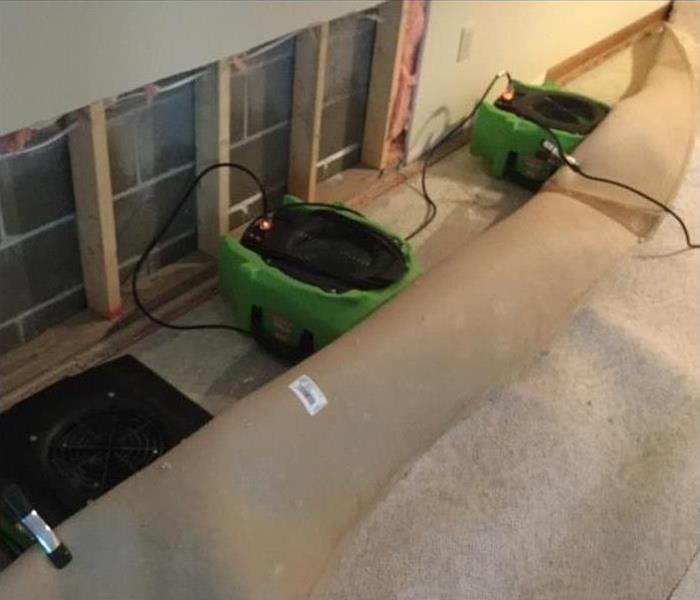 Water in basement with equipment.